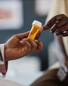 Team member prescribing a patient with study treatment